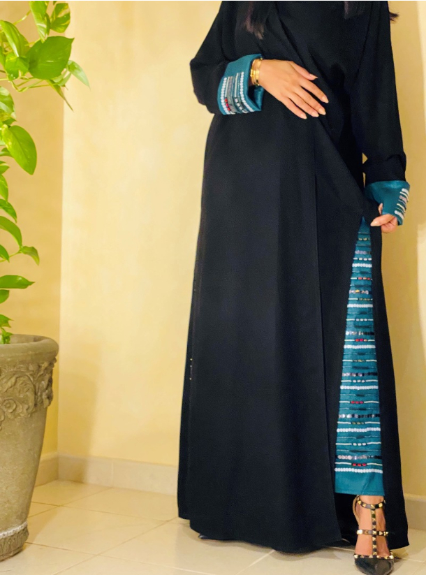 Colored Abaya Colorblock abaya featuring a contrast aqua sleeve cuff