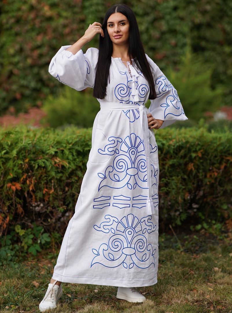 White appliqué White kaftan featuring a stunning blue embroidery with ...