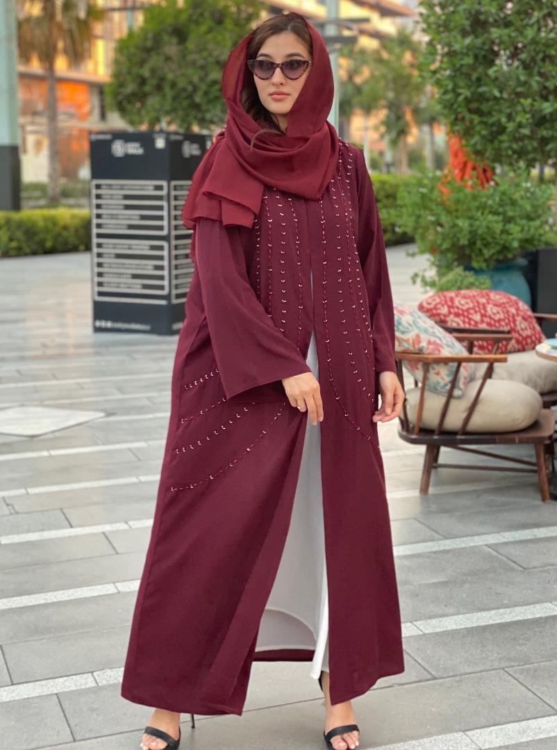 Maroon Abaya Maroon abaya decorated with multi-colored beadwork. Comes ...