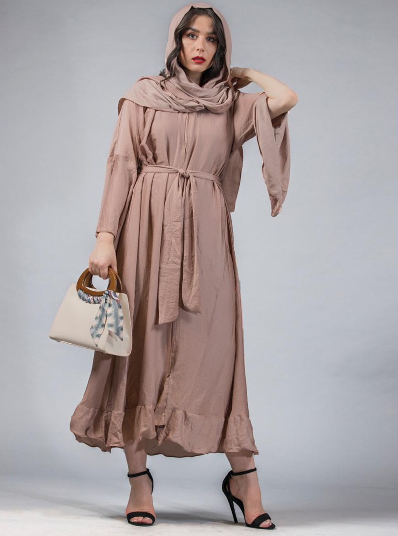 Beige Abaya Maroon abaya featuring a soft-pleated fabric with an ...