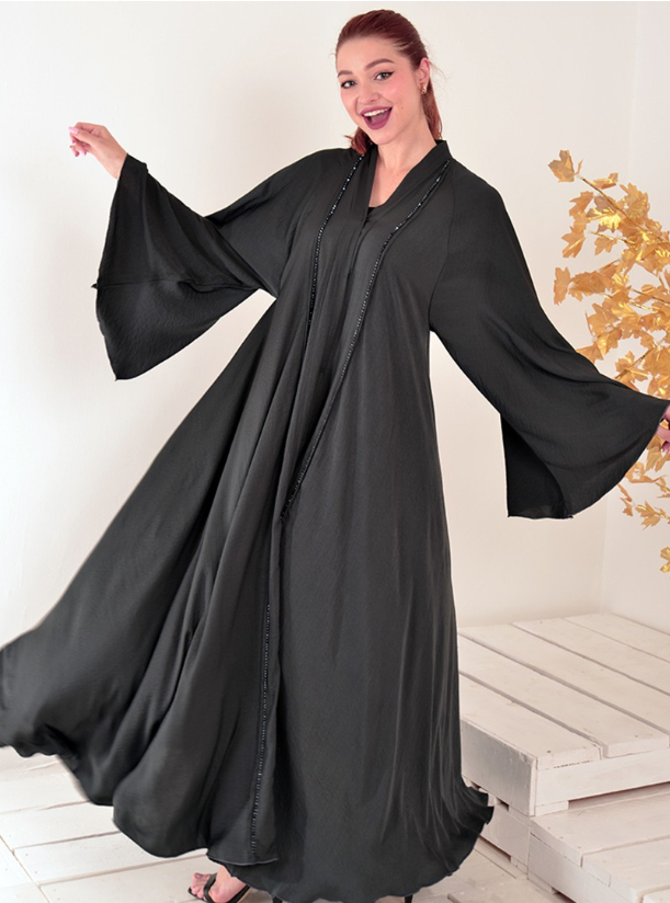 Flowy Abaya Black flowy abaya featuring a swishy hem with wide flared ...