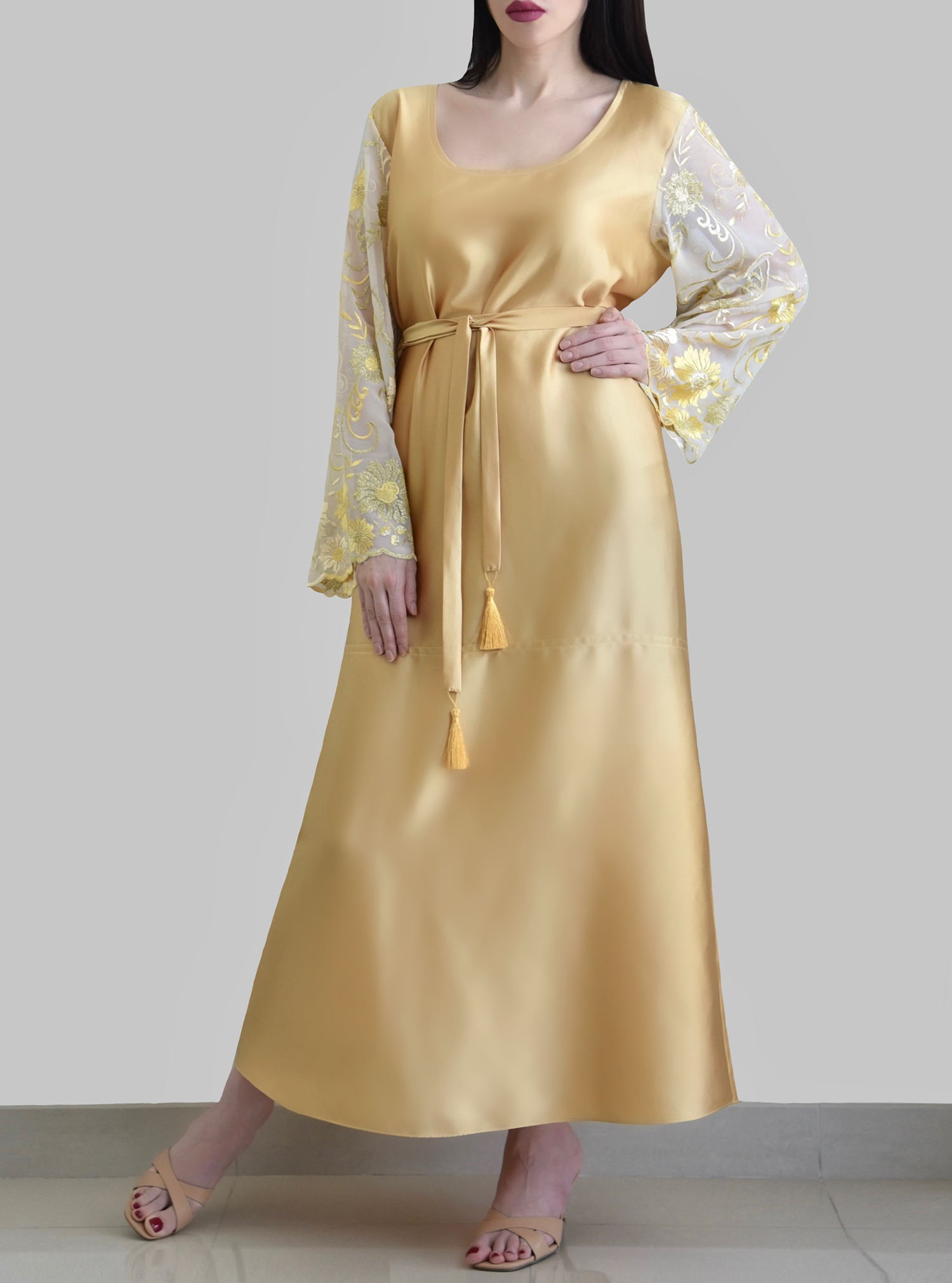 Gold kaftan Gold kaftan with scoop neck and embroidered sleeves. Comes with tassel belt. Kaftans
