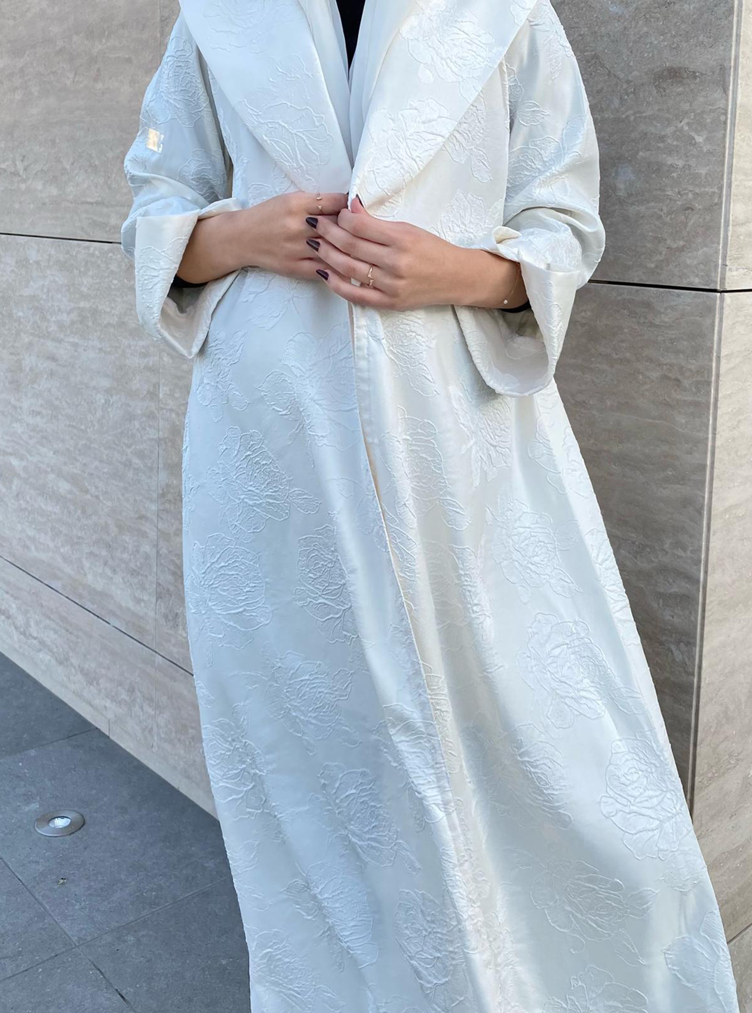 SA5 Coat Abaya White textured coat abaya with collar. Comes with a