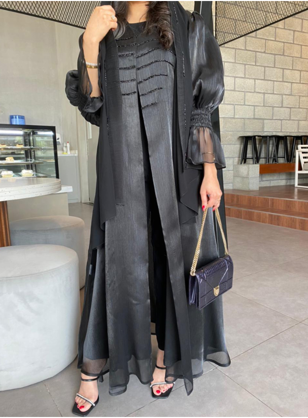 Lilya3 Abaya Black abaya featuring a puffy sleeves and smocked cuffs ...