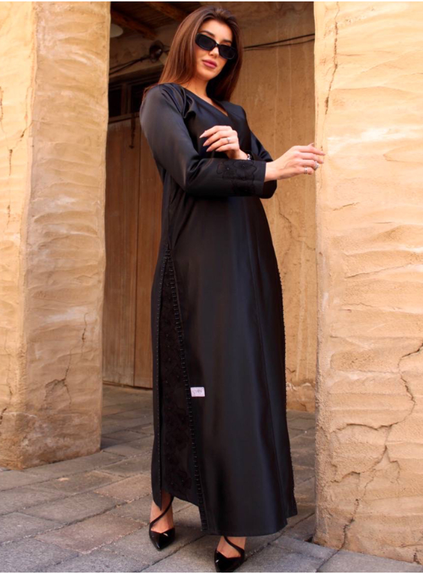 CA04 Abaya Black abaya with slim-fit sleeves, adorned with embroidered ...