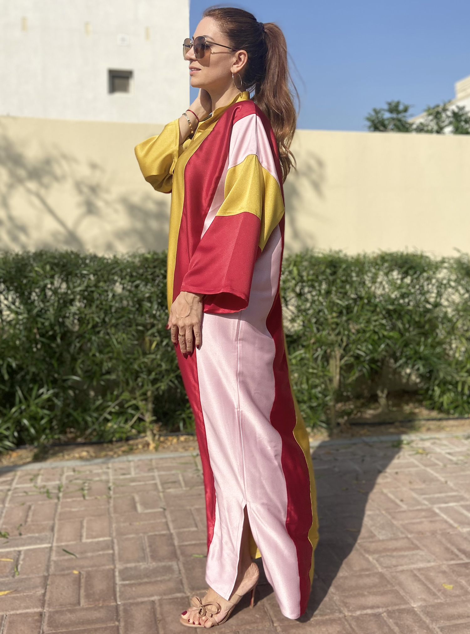Candy Kaftan Kaftan crafted from multi color crepe satin. Features high