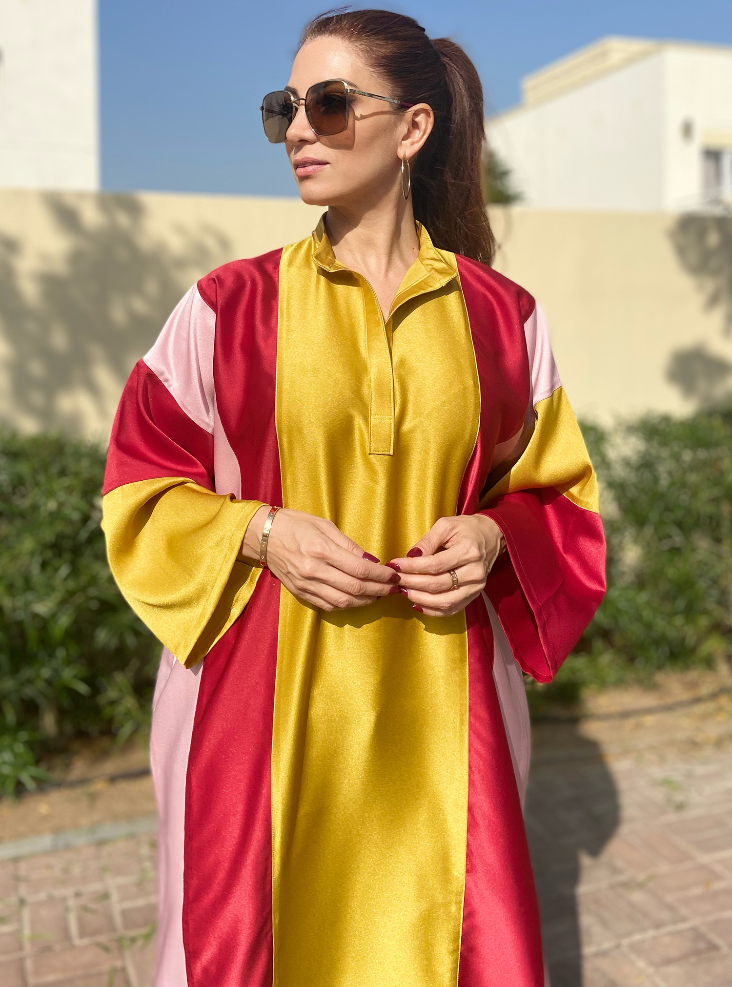 Candy Kaftan Kaftan crafted from multi color crepe satin. Features high