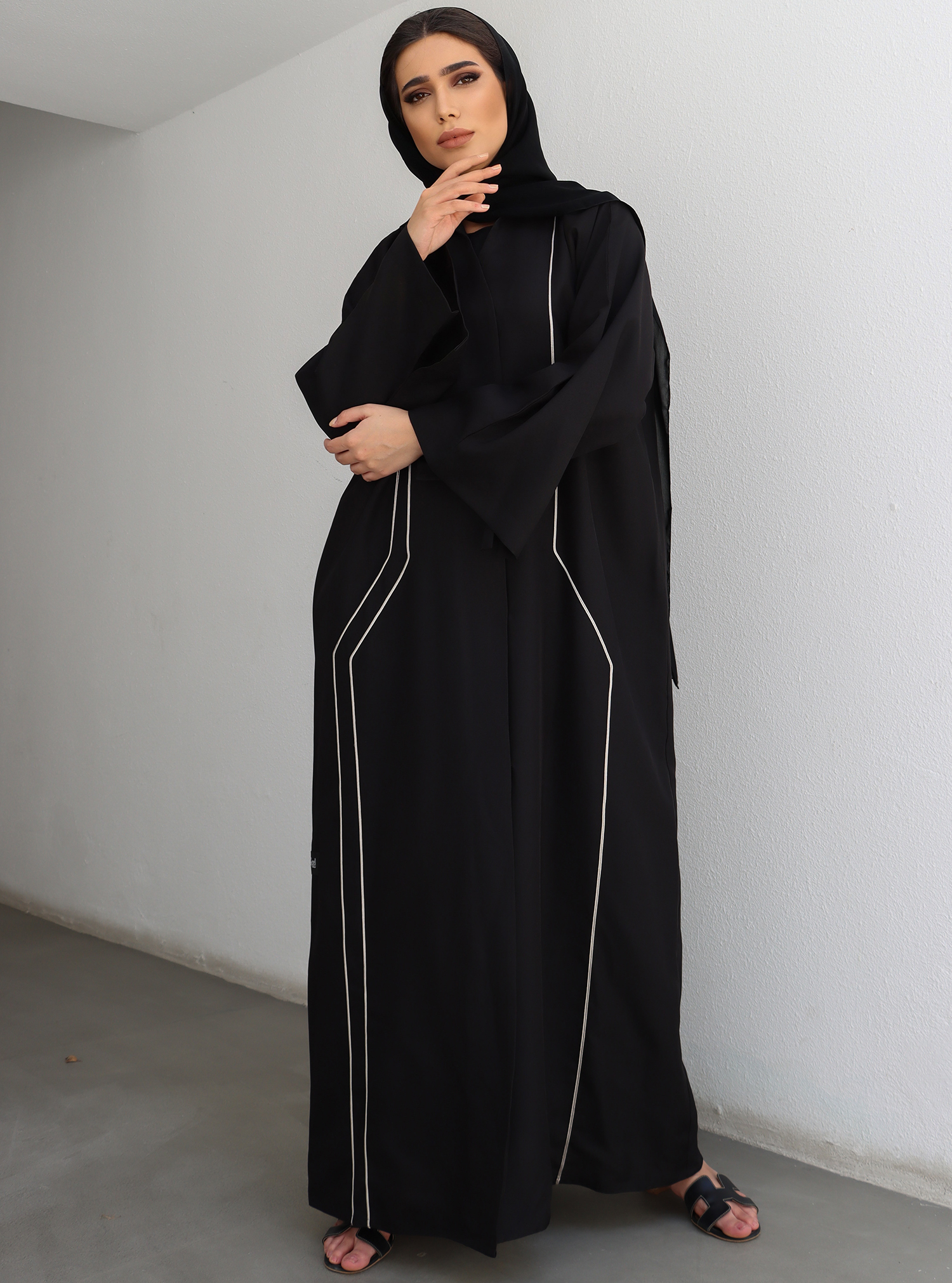 A9 Simple yet elegant daily abaya with lines Abayas from Spell Abaya at Boksha