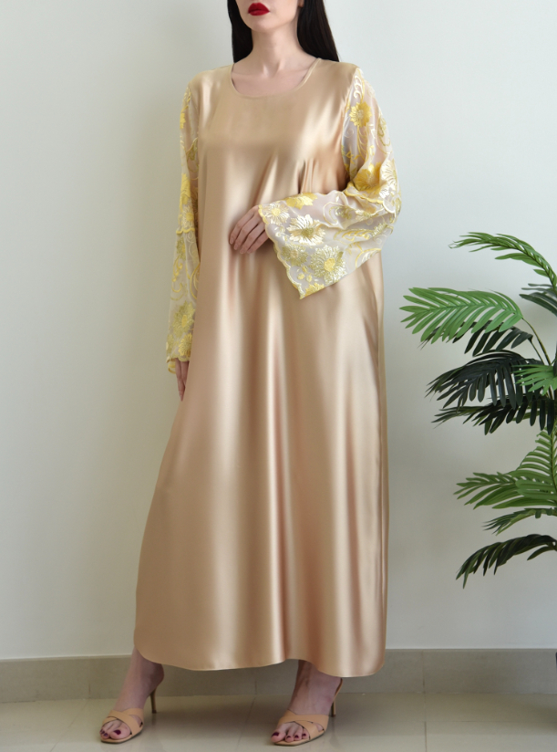 Gold kaftan Gold kaftan with embroidered sleeves Kaftans from 12buttons at Boksha