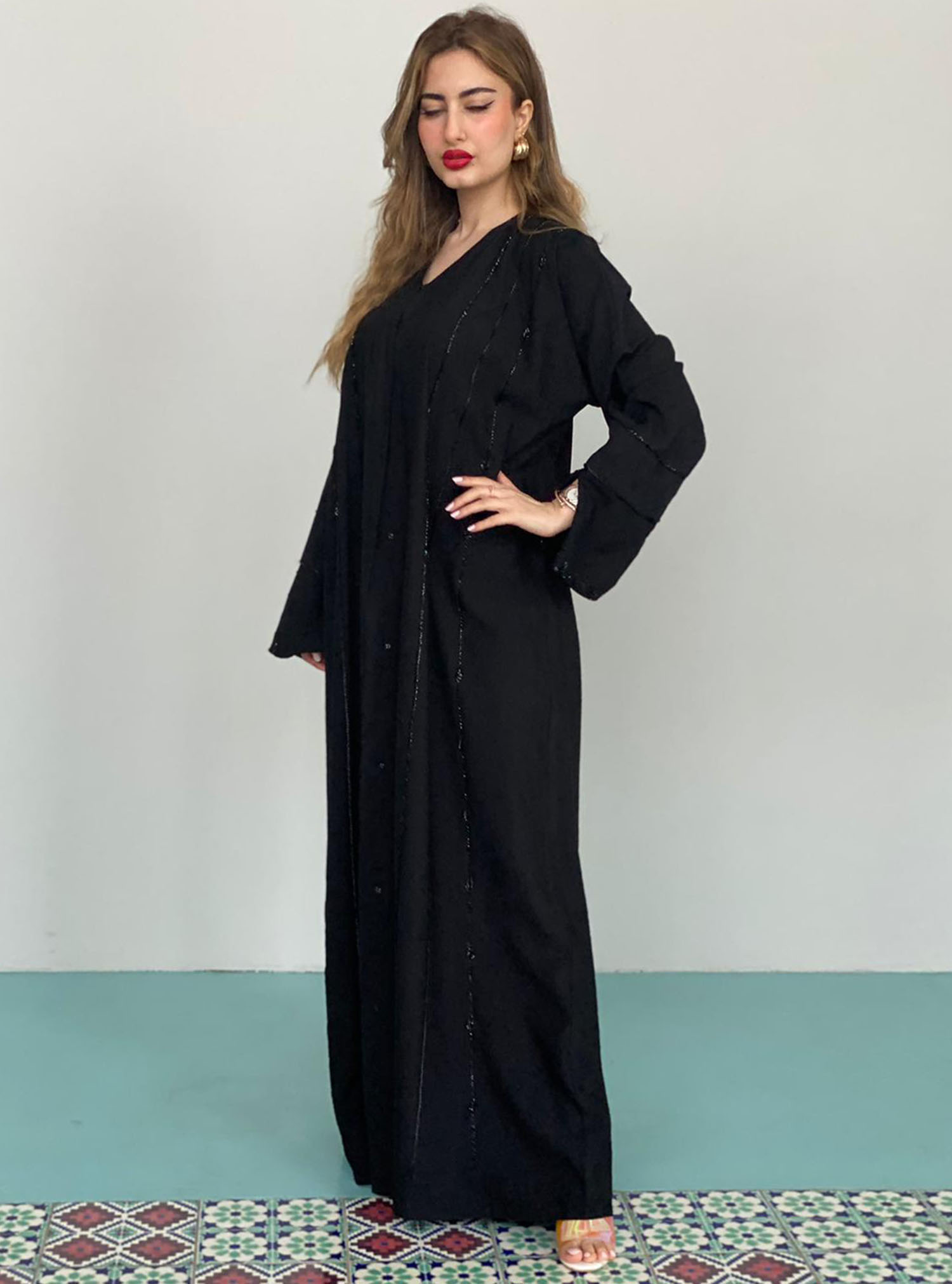 Black Abaya Black abaya with embellishments. Comes with a plain ...