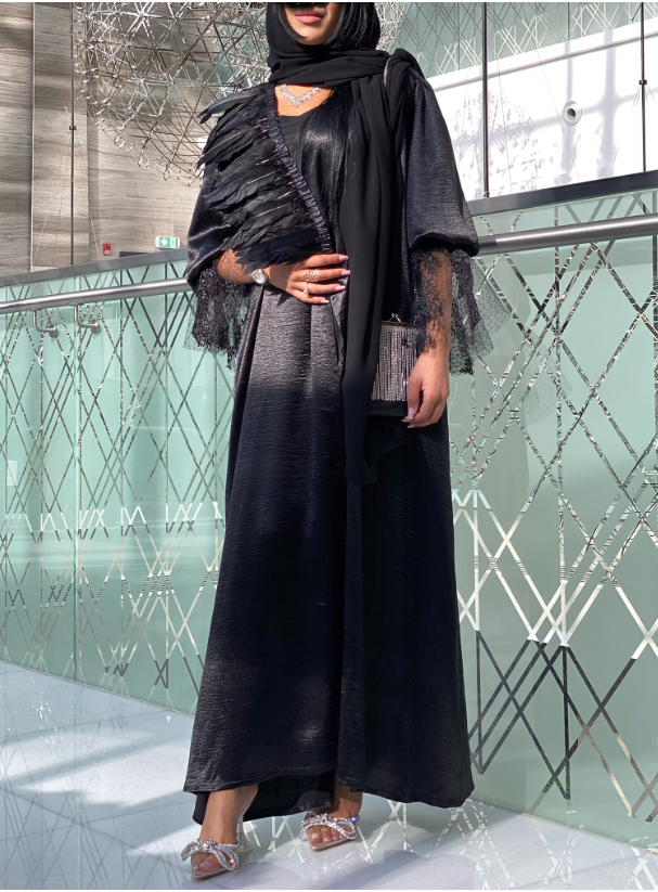 Swan Abaya Black abaya adorned with feathers and tulle sleeves. Abayas ...