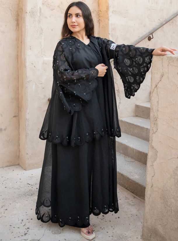 SDS Abaya A beautiful tiered abaya with avian-inspired embroidered ...