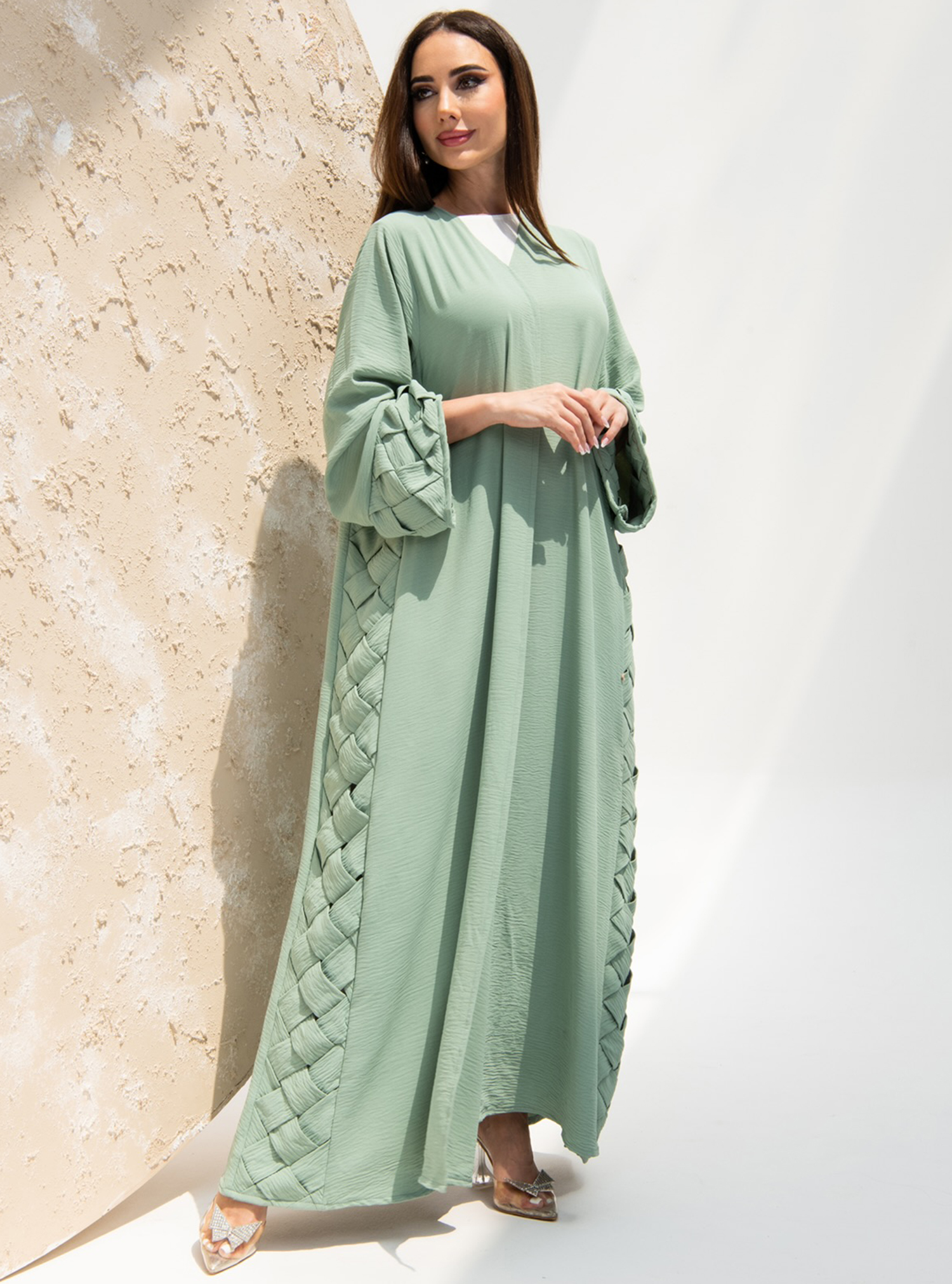 Beryl Abaya Beryl green abaya, features a weave-trimmed design. Comes ...