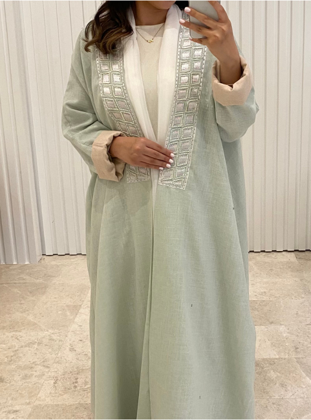 Mint Abaya 12 Mint green abaya with embroidered neckline. Comes with a