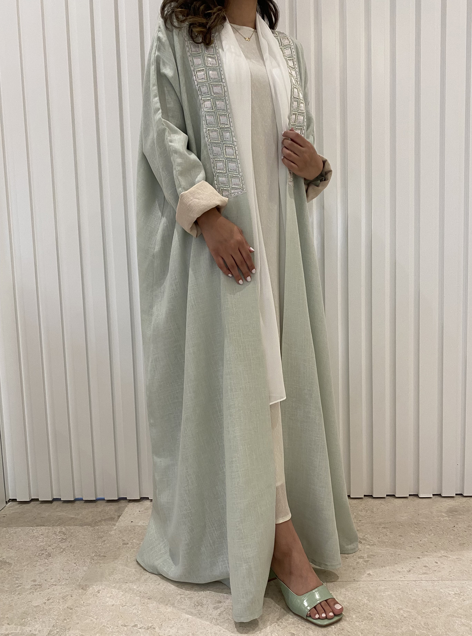 Mint Abaya 12 Mint green abaya with embroidered neckline. Comes with a