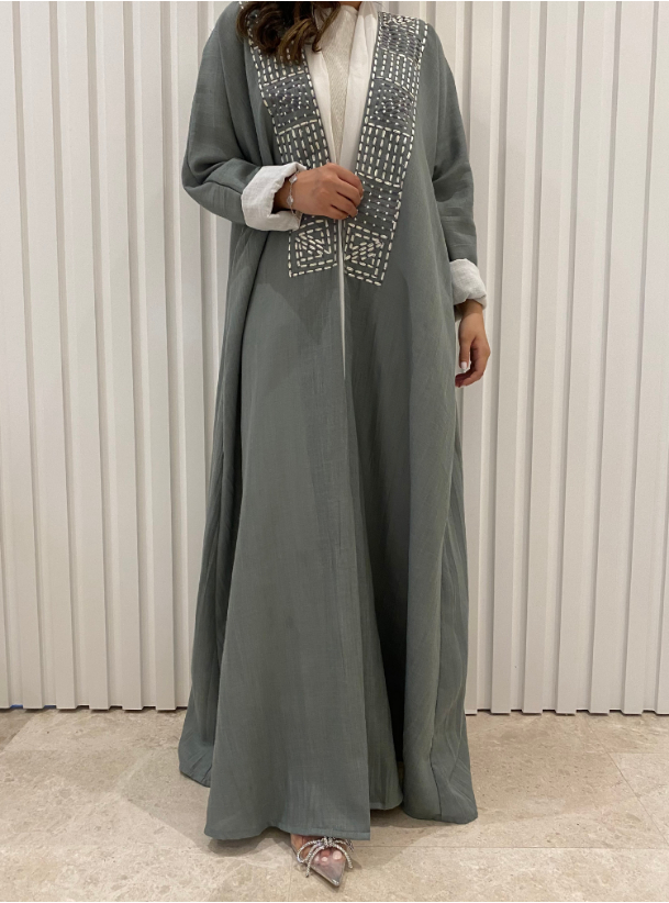 Grey Abaya 16 Grey abaya with embroidered neckline. Comes with a white ...