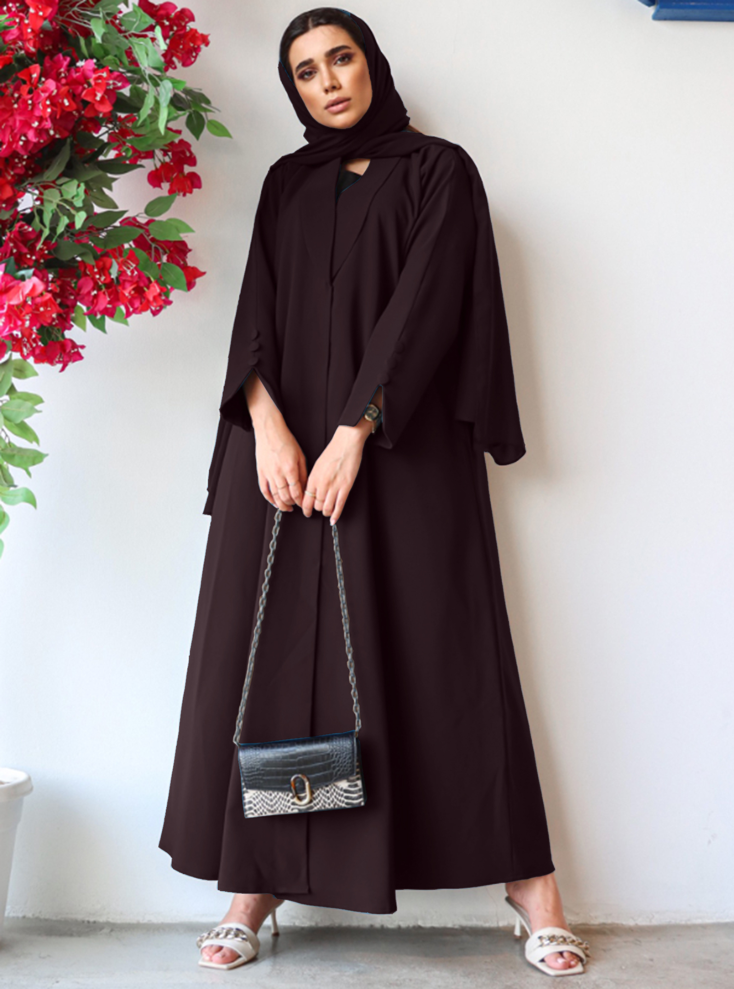 Brown abaya Brown abaya with collar featuring a vented curved sleeve ...