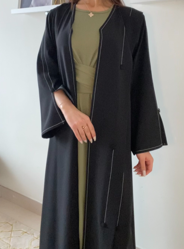 Stitch & Button Black abaya with contrast stiches and decorative ...