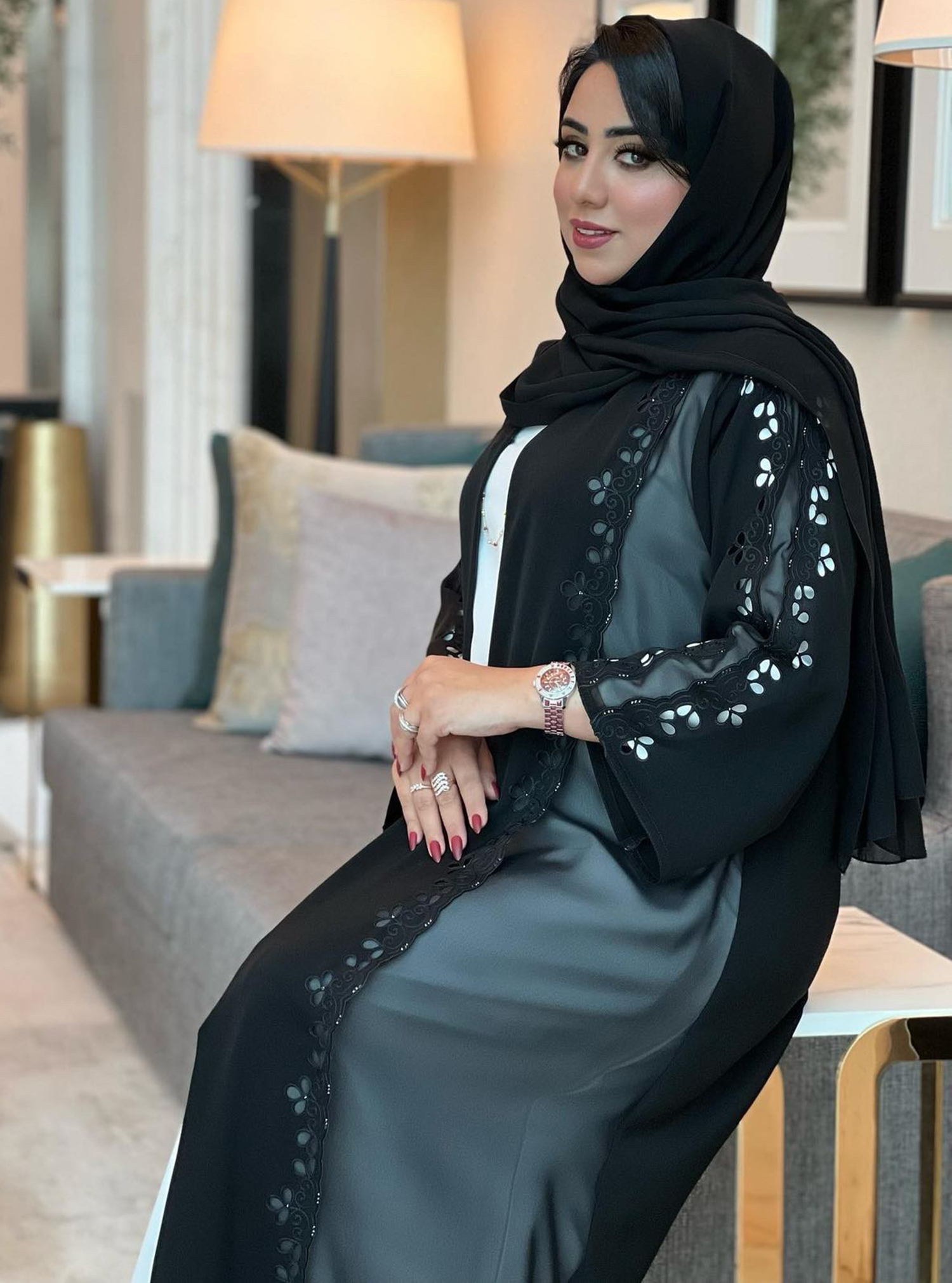 MODEL 7684 Black abaya with laser-cut trimmings. Comes with a