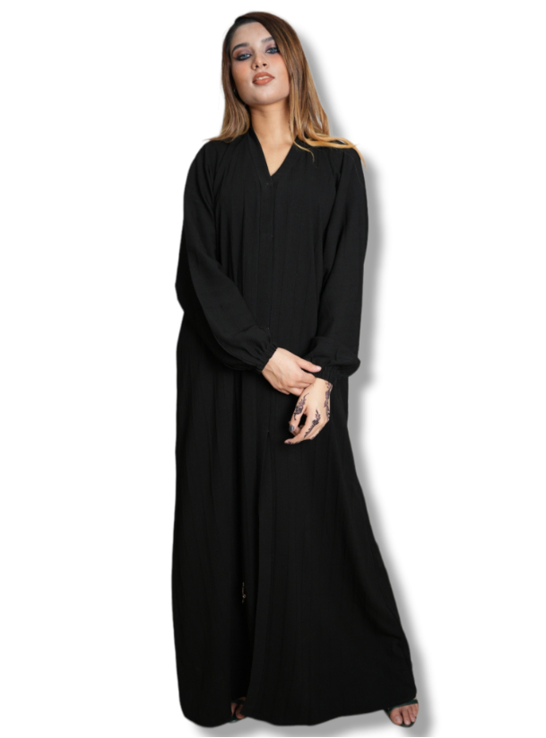 Lined abaya Black textured fabric abaya with elastic sleeves. Comes ...