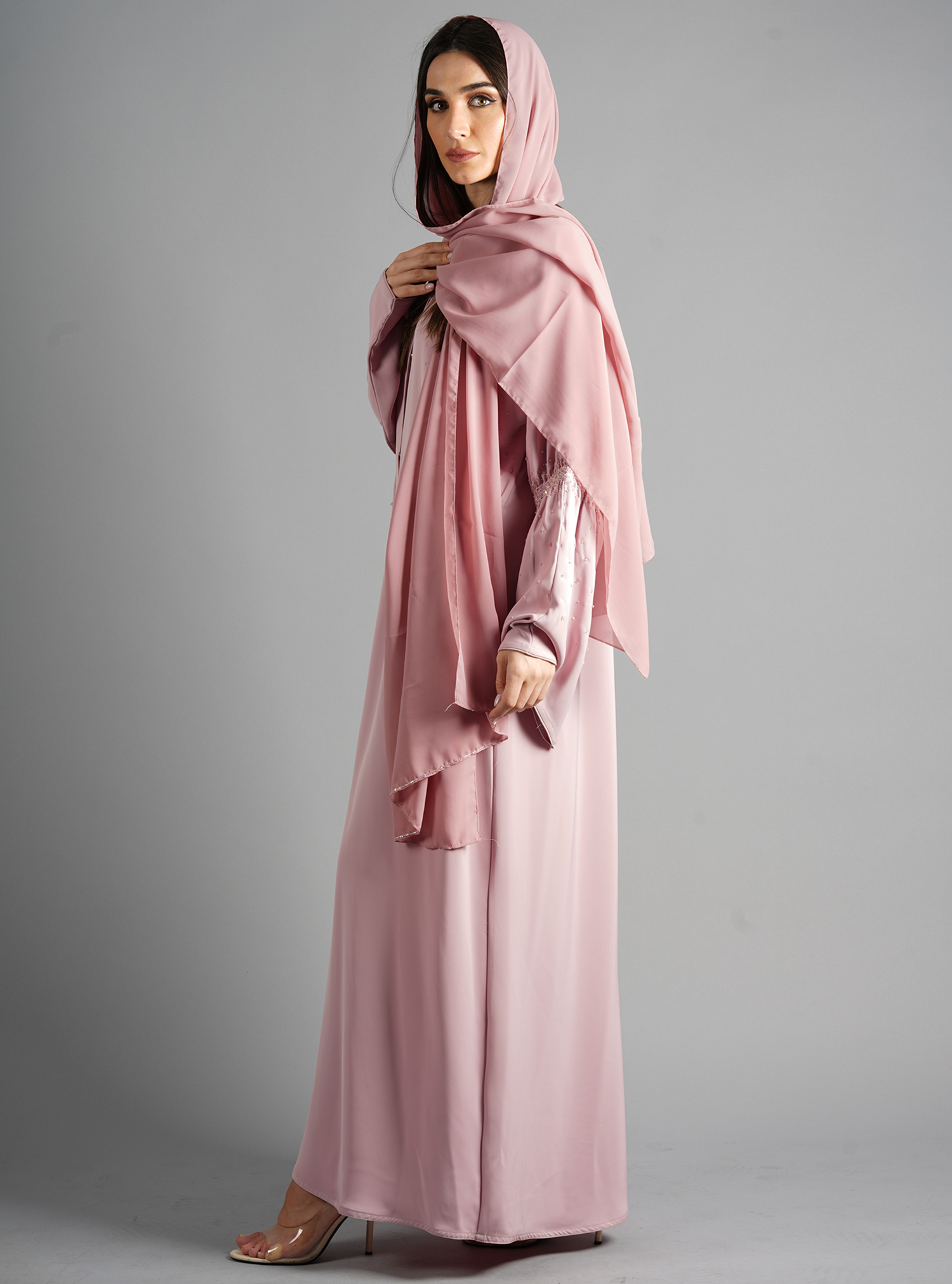 Pink abaya Pink embellished abaya with smocked details. Comes with a ...