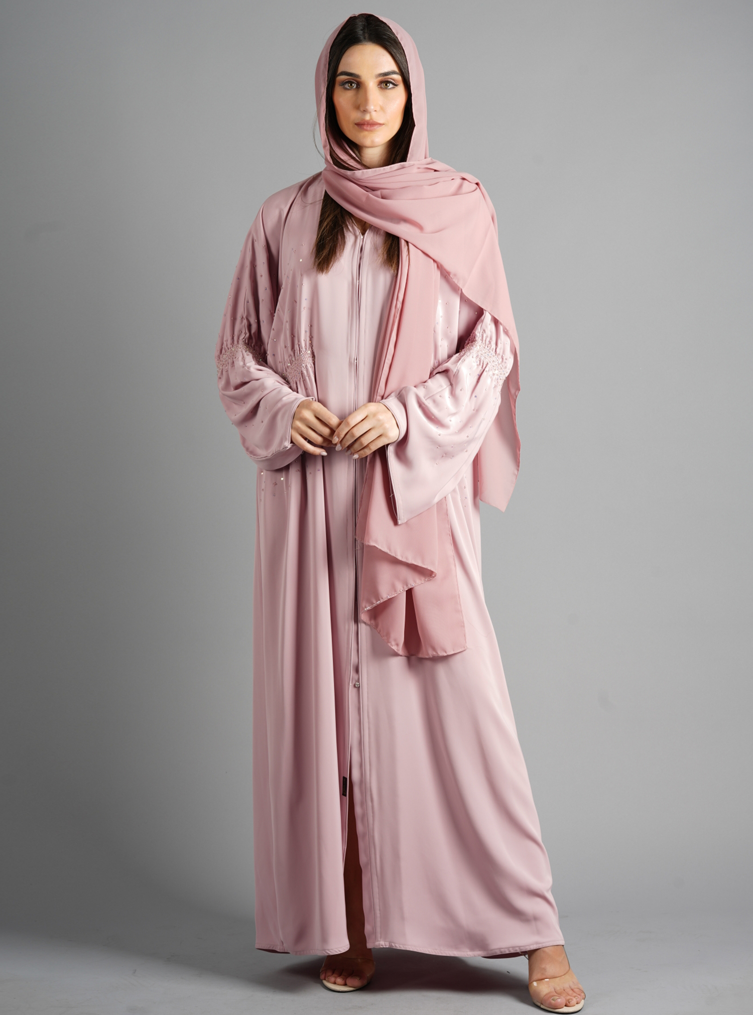 Pink abaya Pink embellished abaya with smocked details. Comes with a ...