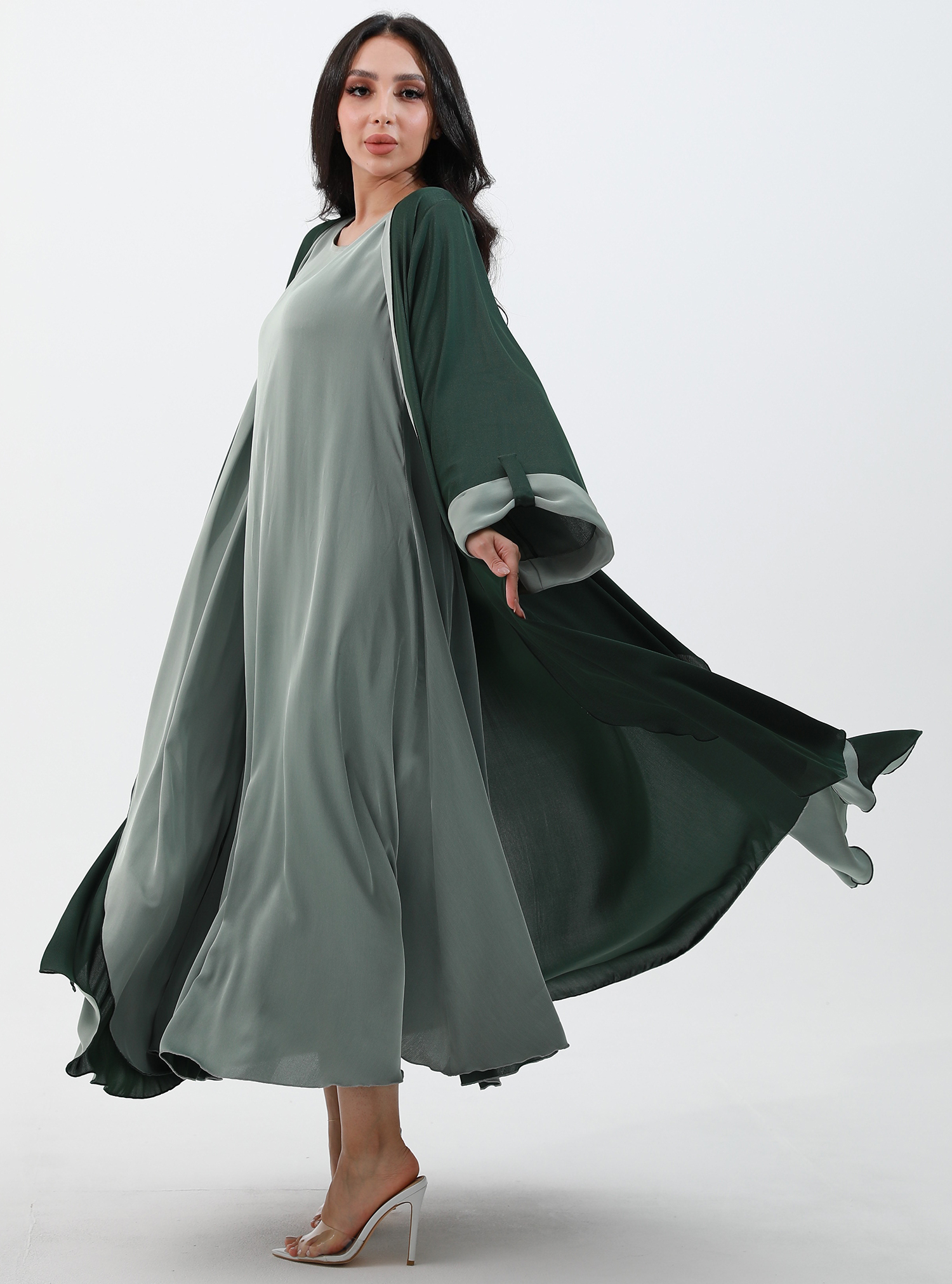 Abaya Set 3-piece set featuring a green abaya with a sleeveless inner ...