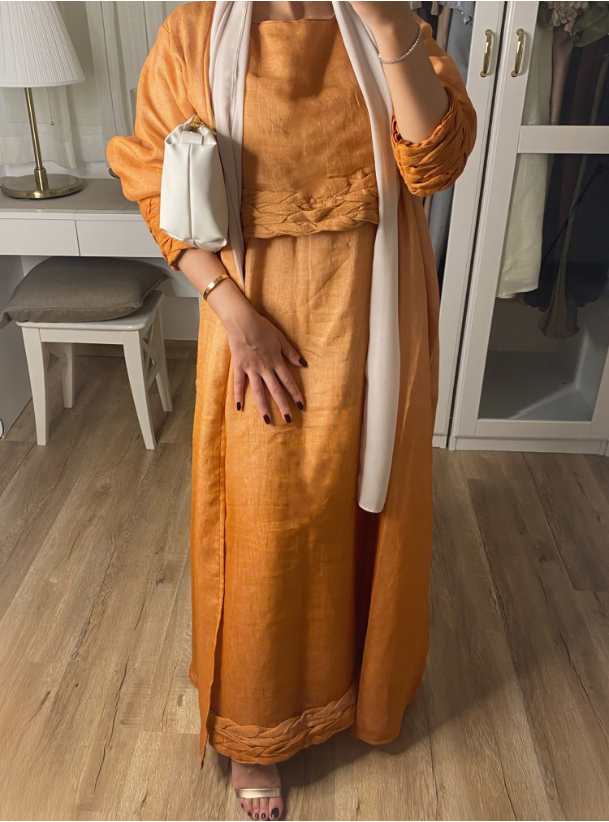 Braided Set Orange ombre braided linen set that includes an Abaya with inner dress and headscarf. Abayas from at Boksha