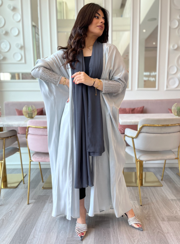 Baby blue abaya Baby blue elegant abaya with handmade beads. Comes with ...