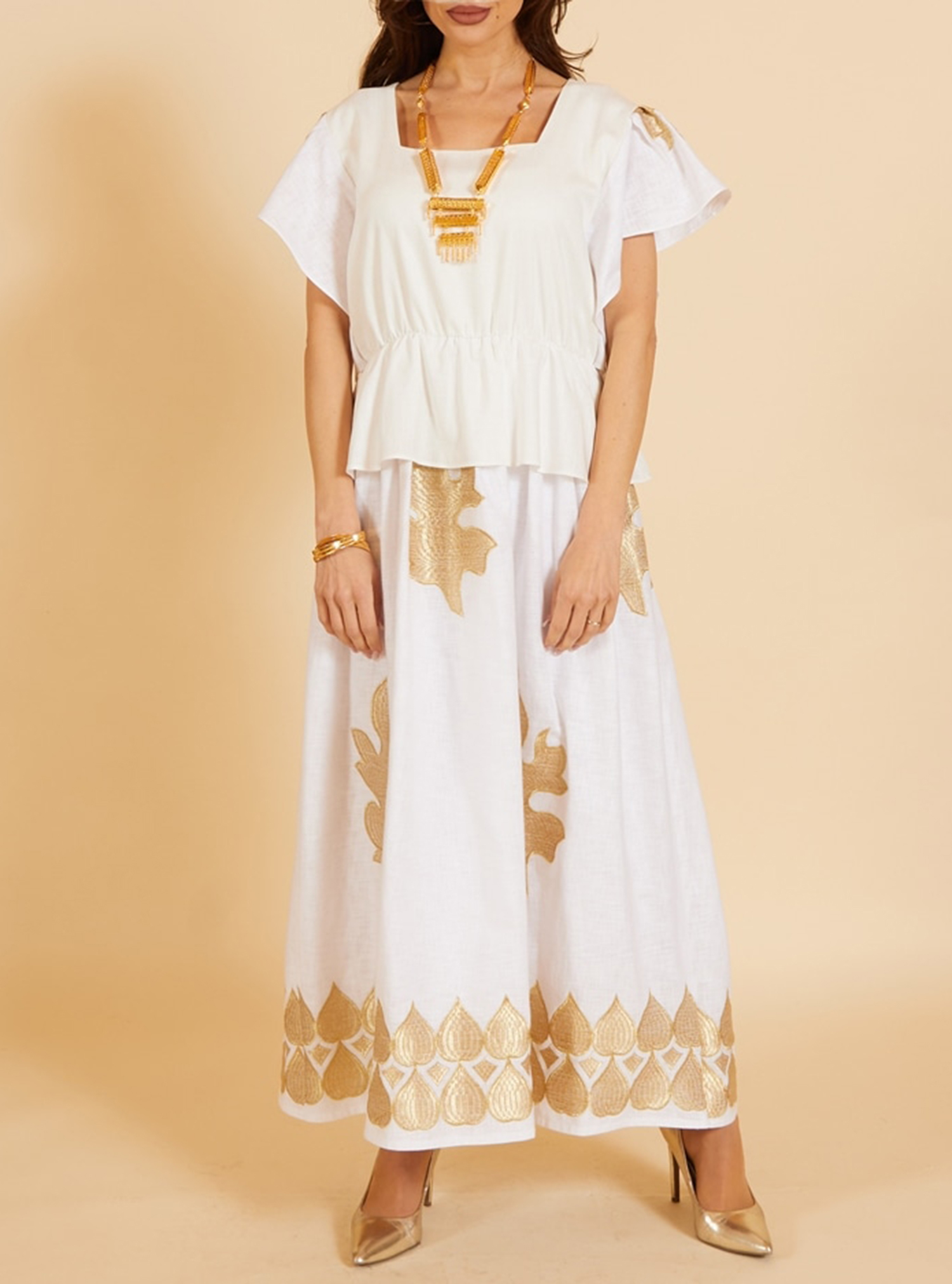 Linen Kaftan P5M6 Linen embroidered kaftan. Length 53 inches Kaftans from Phases Boutique at Boksha