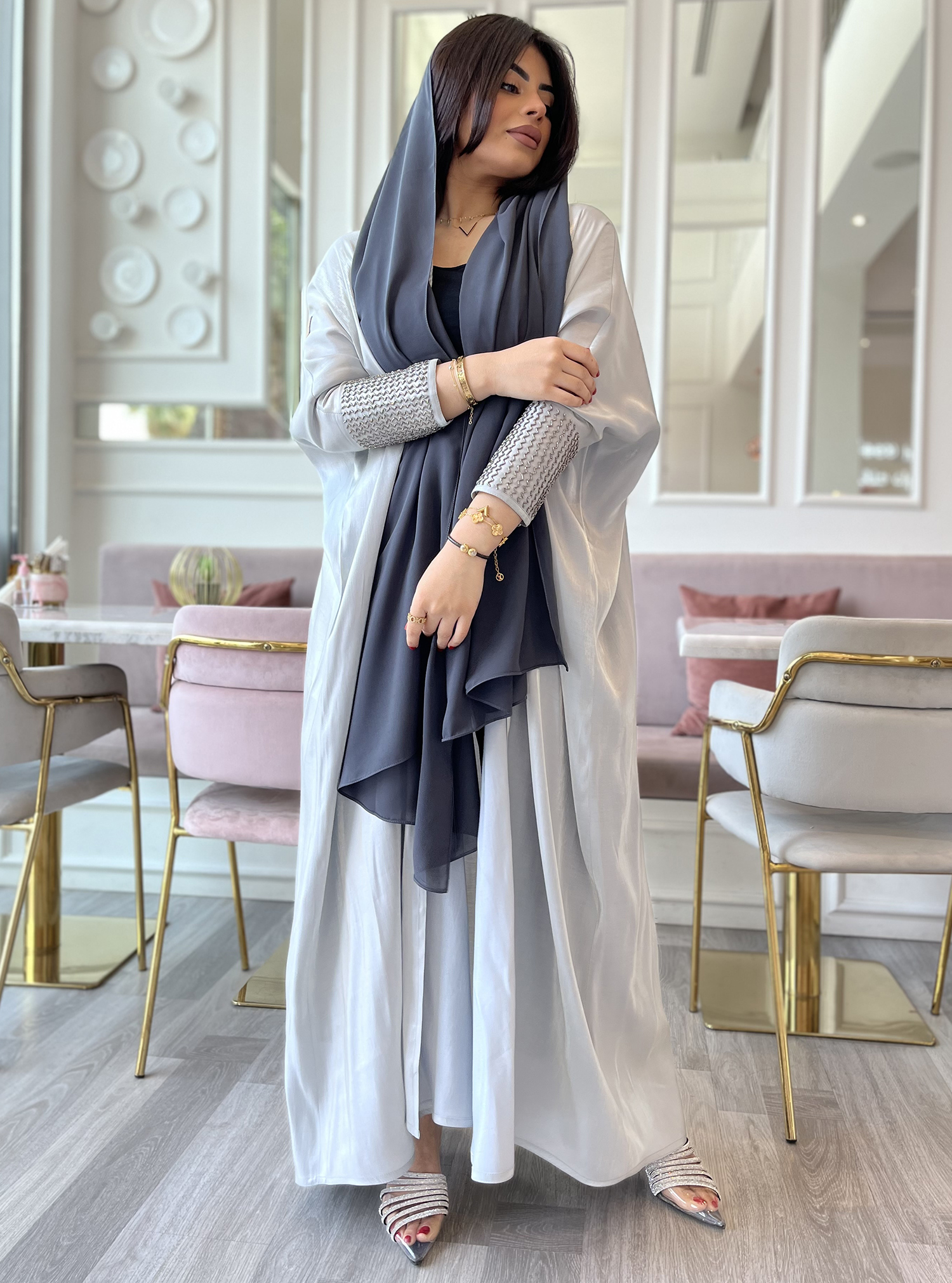 Silk Abaya Elegant baby blue abaya with embellished sleeves. Comes with ...