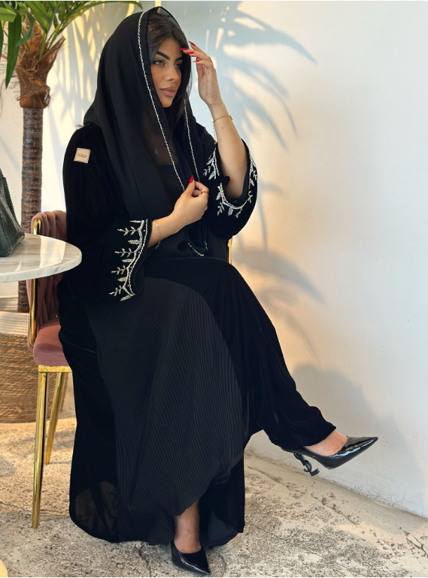 Black Abaya Elegant black abaya with embellished sleeves. Comes with a ...