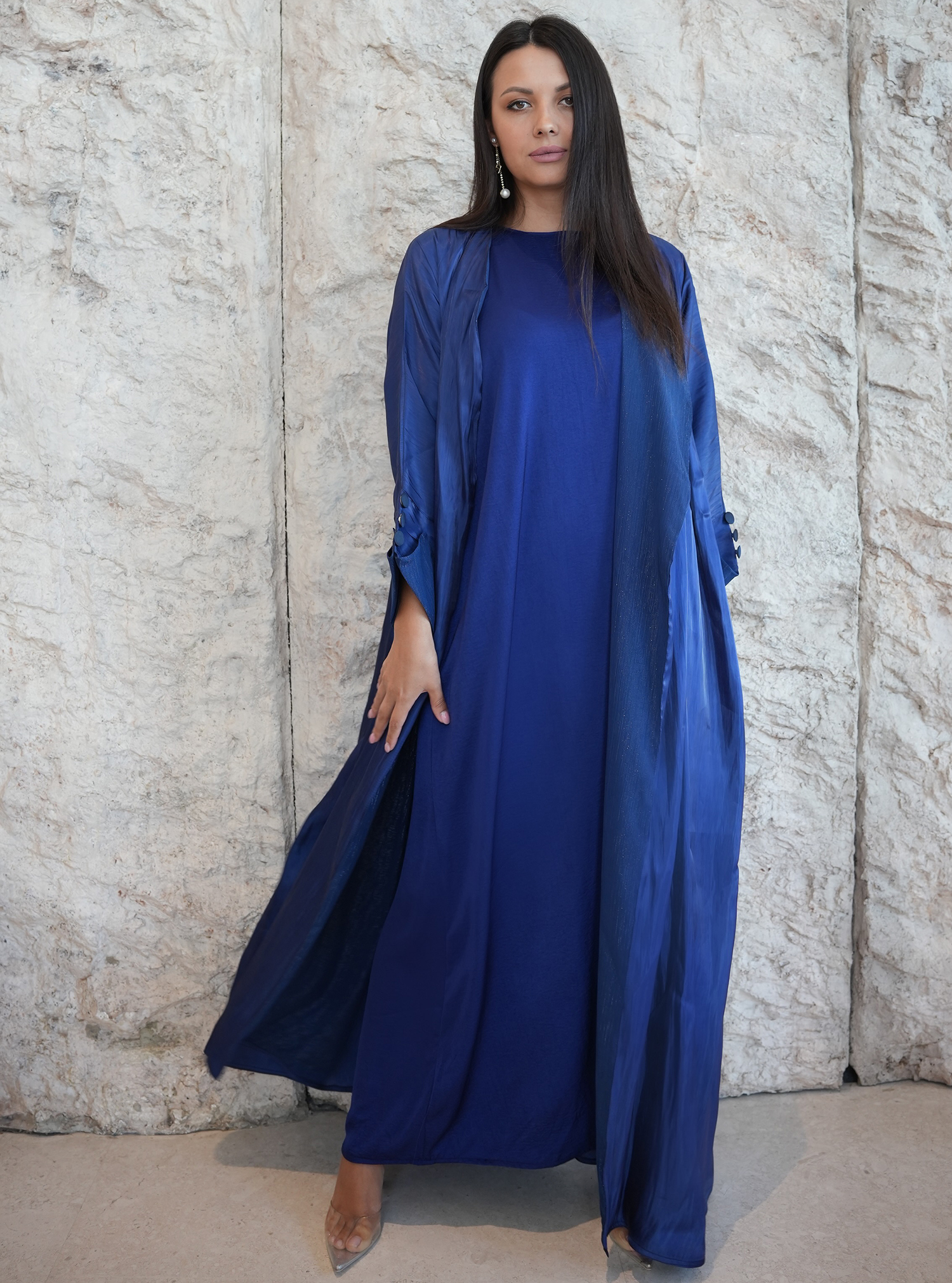 Blue abaya The blue abaya is dubbled with a blue glitter fabric which ...
