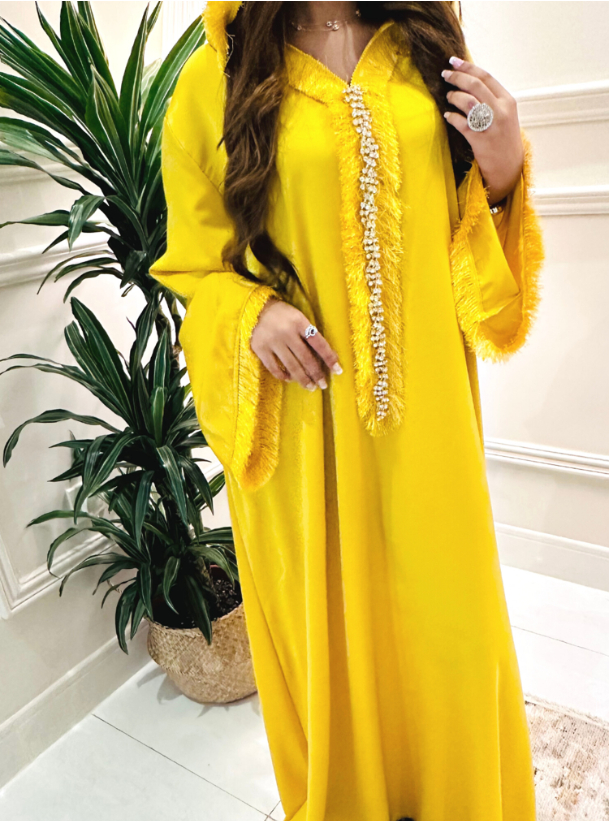 Yellow Jalabia Yellow jalabiya featuring a delicately trimmed neckline ...