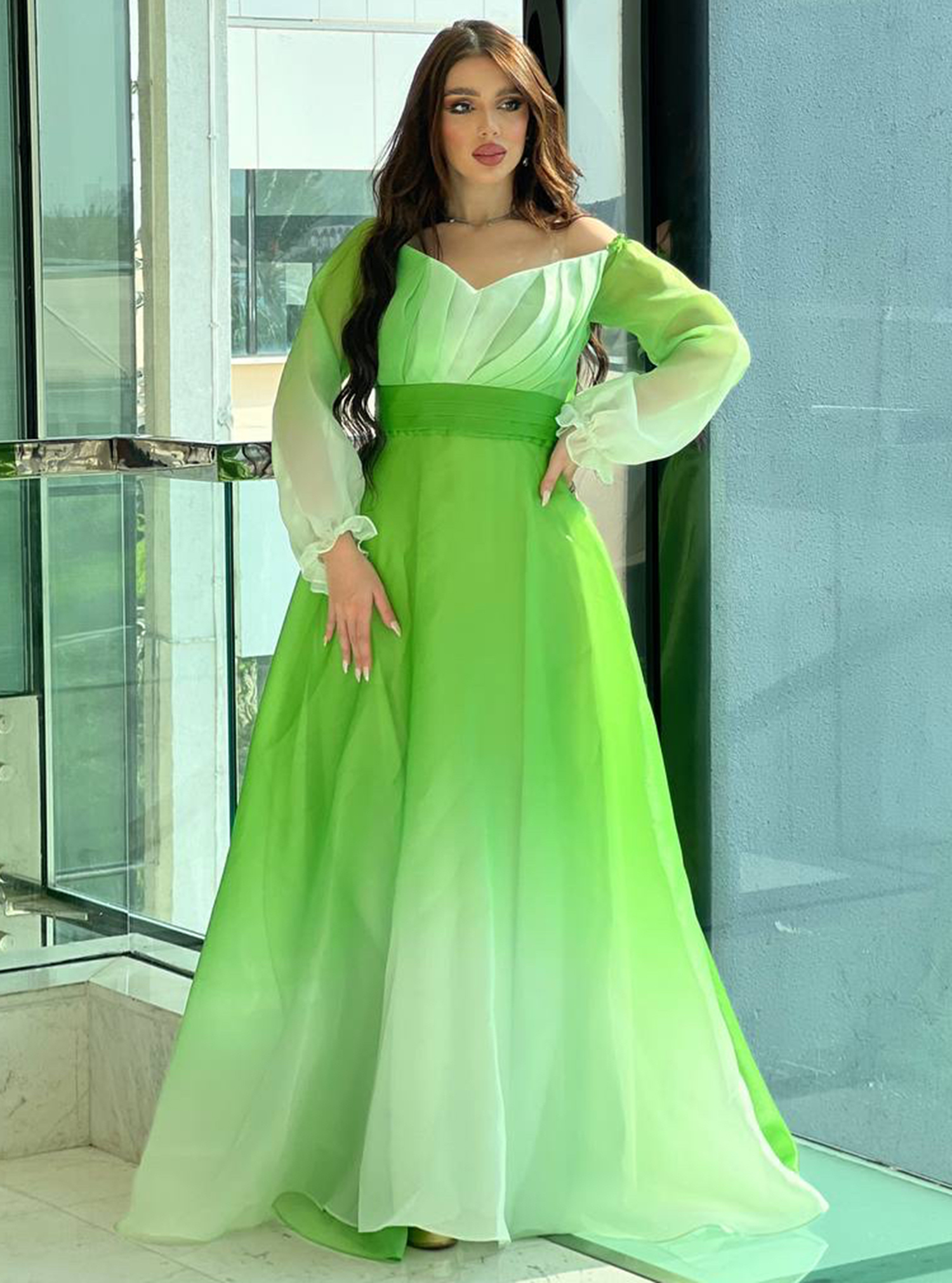 Green dress Two toned green dress featuring a flowy silhouette Dresses from Cage Doree at Boksha