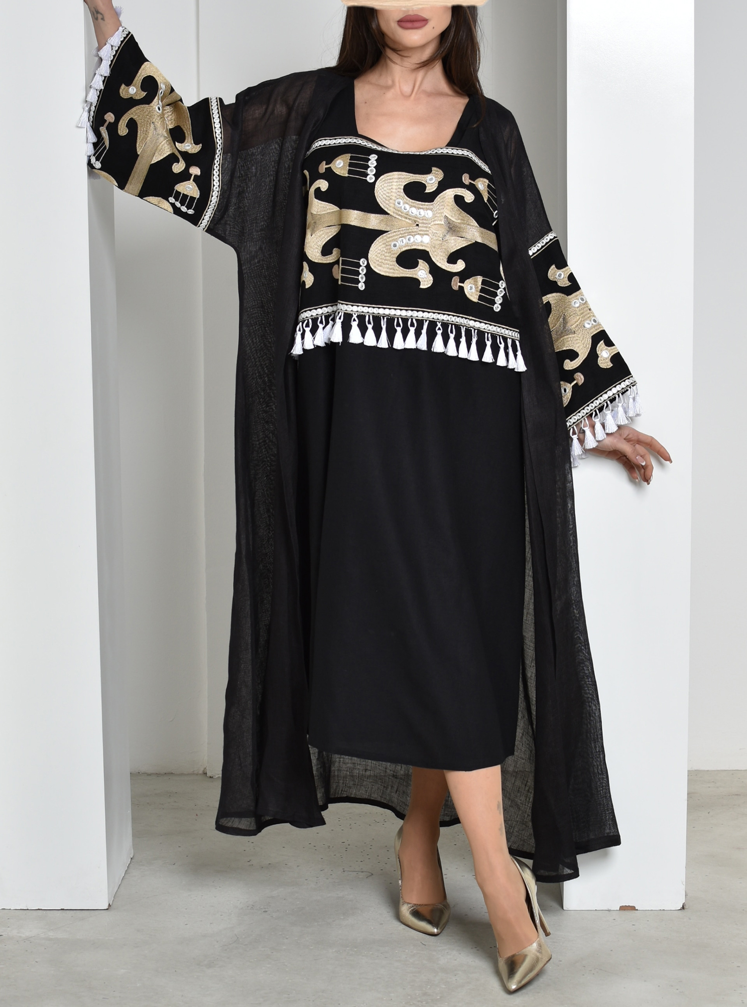 Linen Kaftan Linen embroidered kaftan. Length of bisht 53 inches and length of inner dress 49