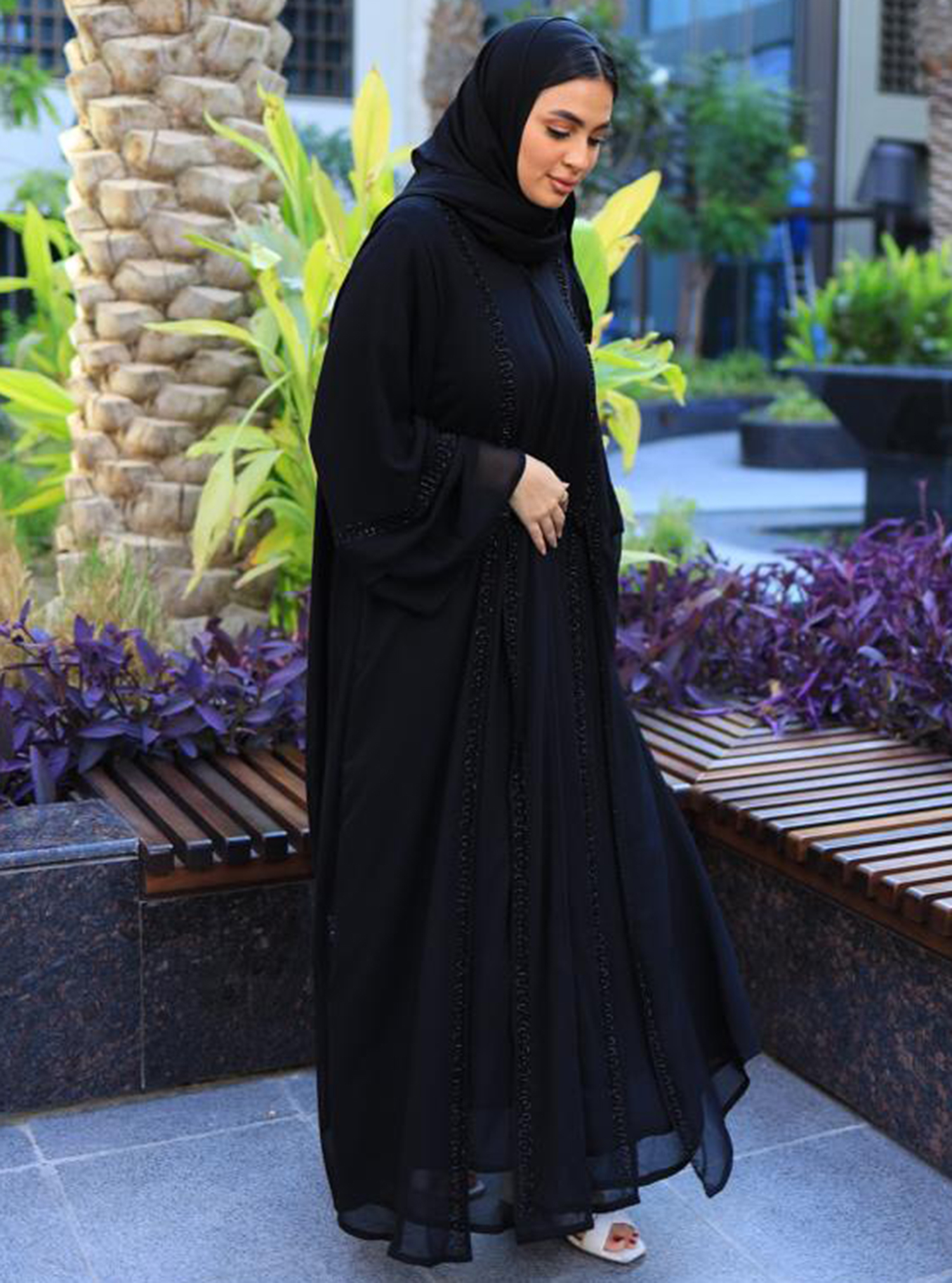 Chiffon Abaya Black double-layered chiffon abaya in a classic silhouette  adorned with embellishments. Abayas from Cle Fashion at Boksha