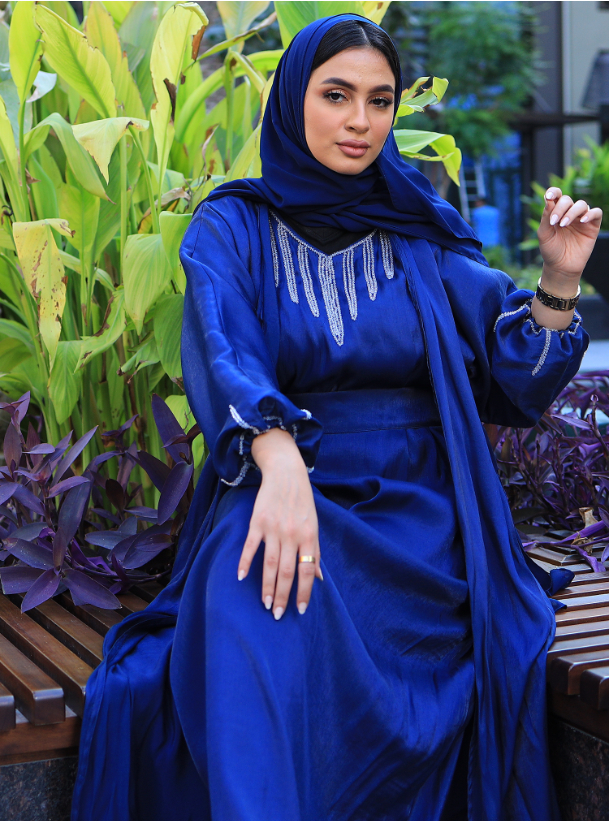 Blue Abaya Blue abaya with bubble sleeves. Comes with an inner dress and  headscarf. Abayas from Jewel Design at Boksha