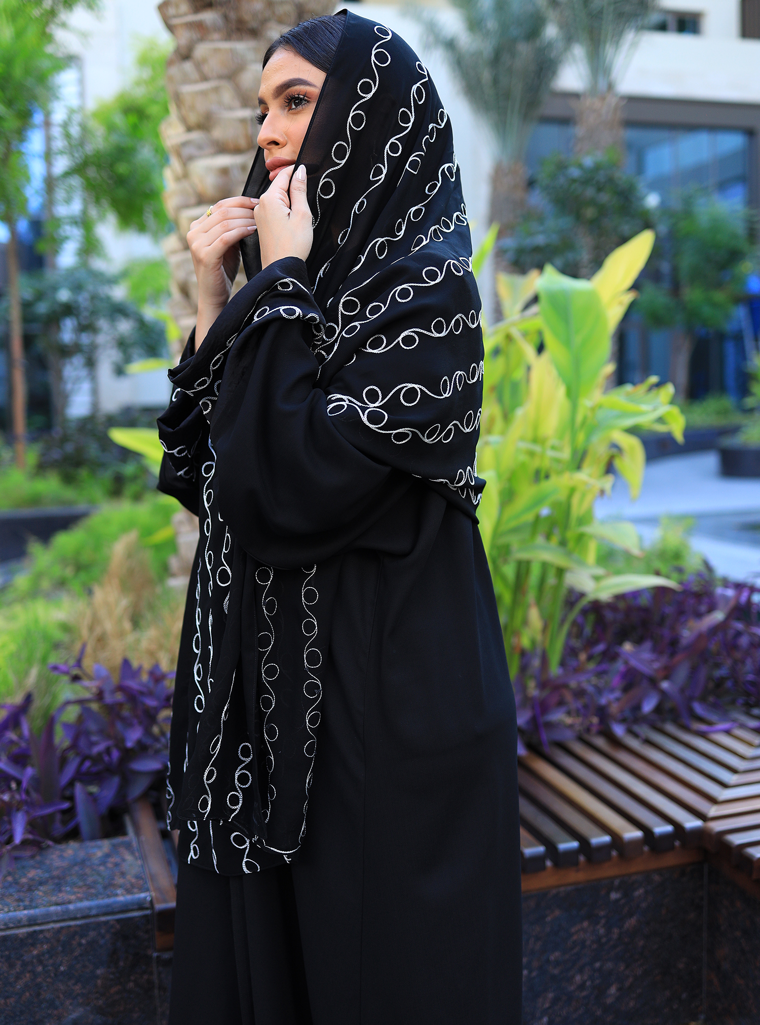 Circles Abaya A classic black abaya adorned with circular shape design ...