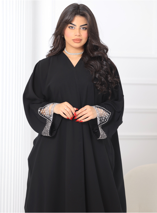 Abaya Stunning abaya adorned with hanging pearls and intricate sleeve ...