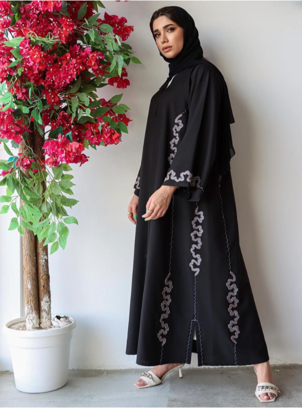 Sk144 Elegant black abaya adorned with embellished details Abayas from ...