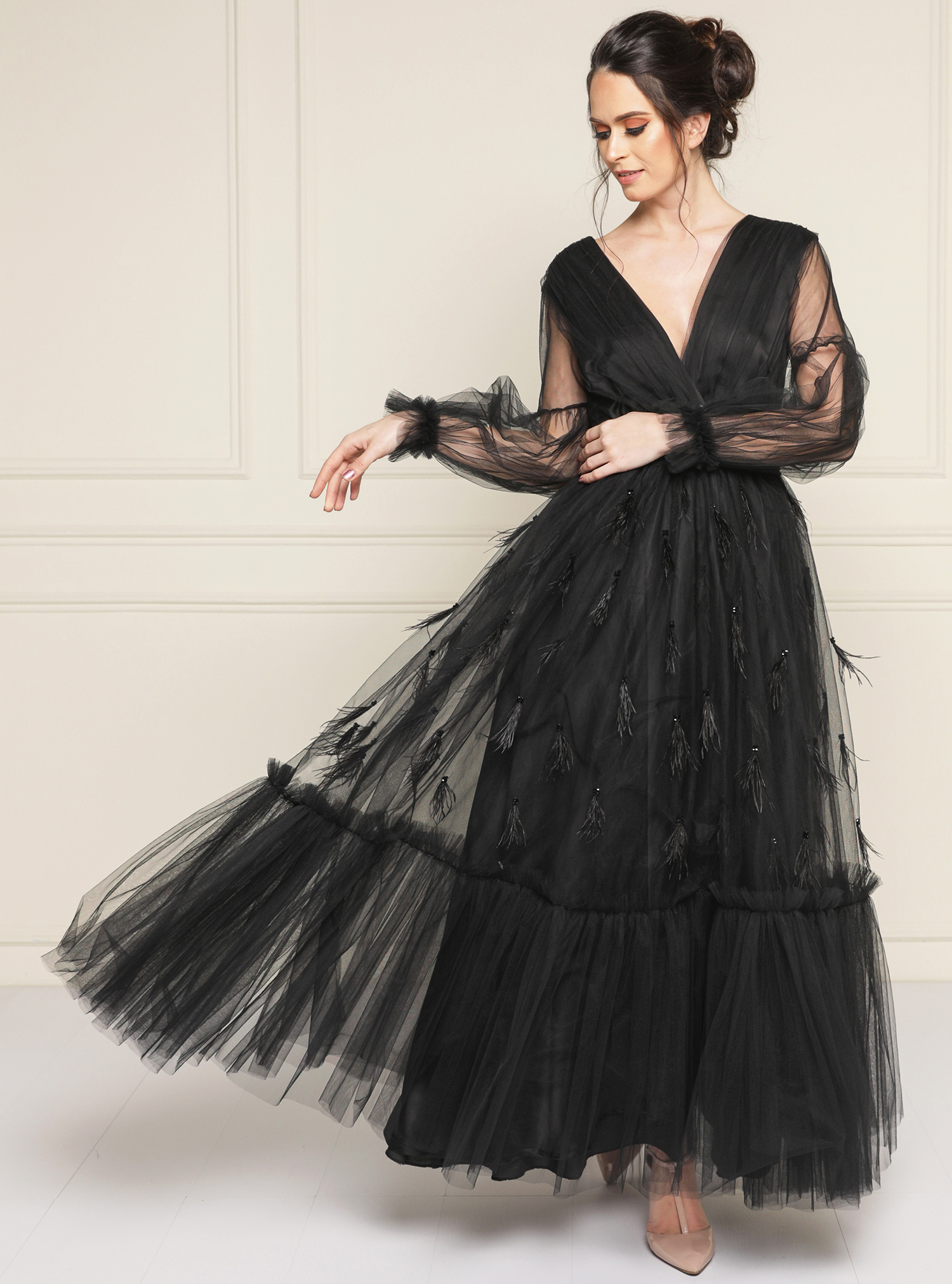 NBQ20002A Tulle layered gown with feathers and embellishment 
