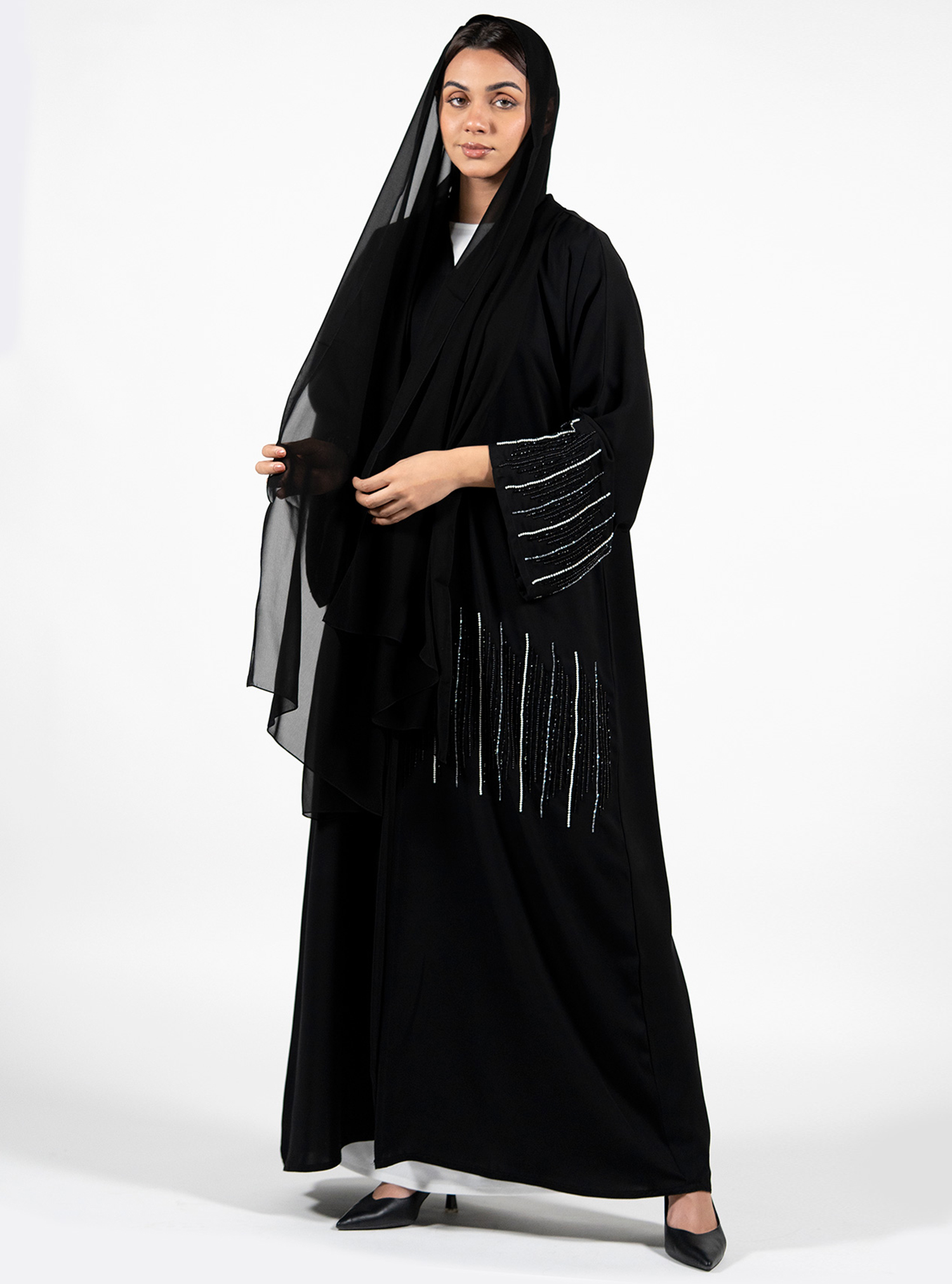 Beads Abaya Beads embellished in linear fashion add up the elegance ...