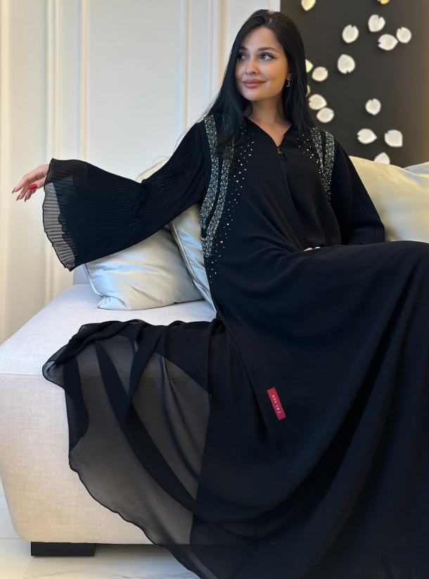 Elegant Abaya Elegant abaya adorned with intricate embroidery and ...