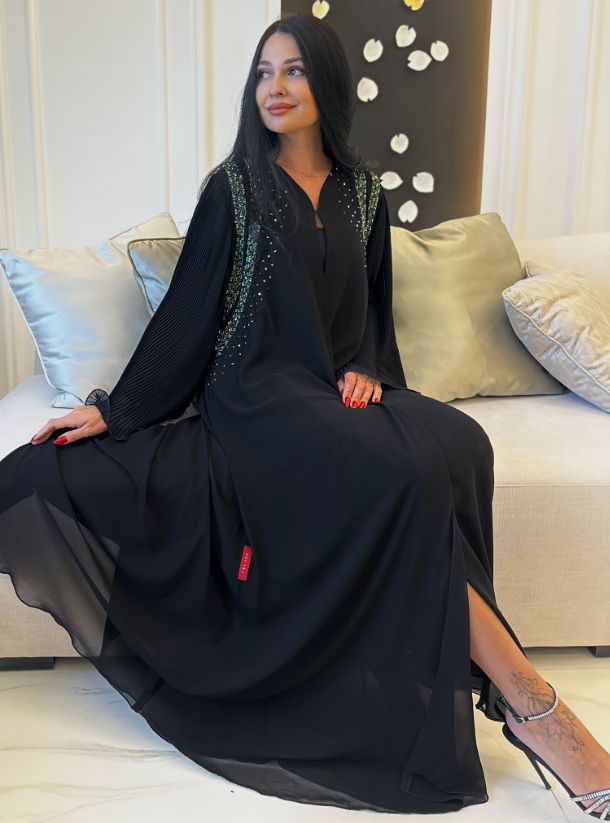 Elegant Abaya Elegant abaya adorned with intricate embroidery and ...