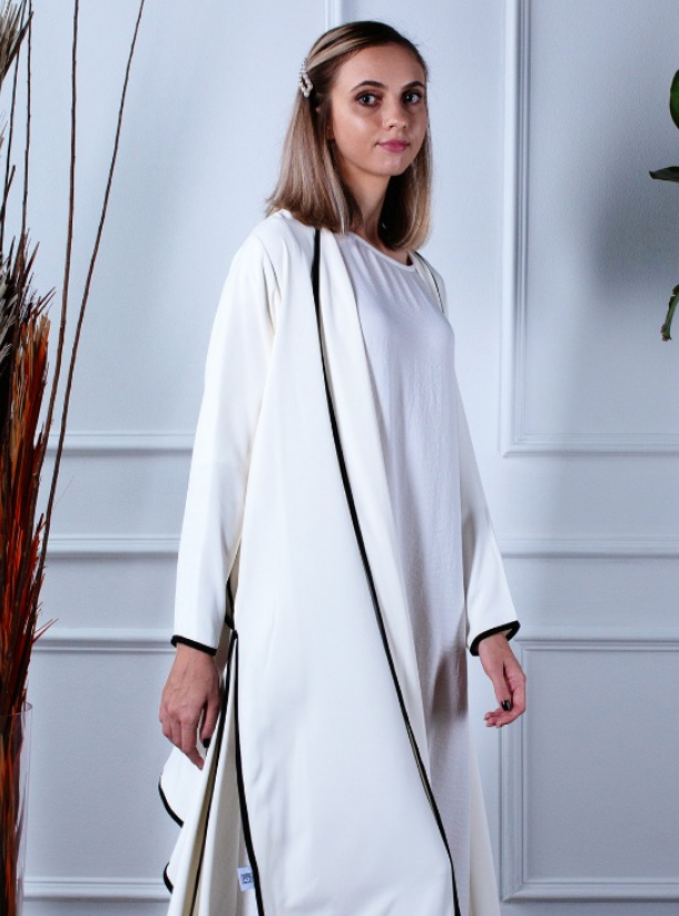 Hayah3-19-24 Stunning off white abaya with black piping Abayas from ...